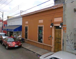 Photo of an estetica from the street with no sign of any kind