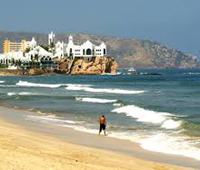 mazatlan beach with Valentino's night club castle