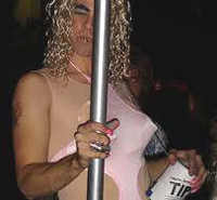 ugly drunk stripper hanging onto her pole