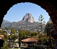 Daytime view of La Pena, a huge stone outcrop that dominates the city skyline